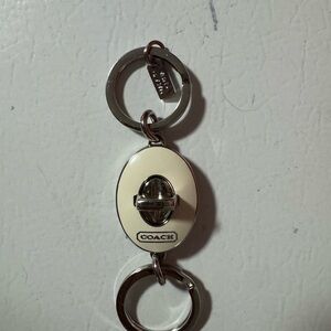 Coach Metallic Silver and Cream Keychain